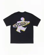 Black Stussy graphic tee next to a black Stussy hoodie, styled for a Halloween night out.